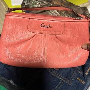 Coach small clutch/wristlet with inside credit card or id slots and pocket